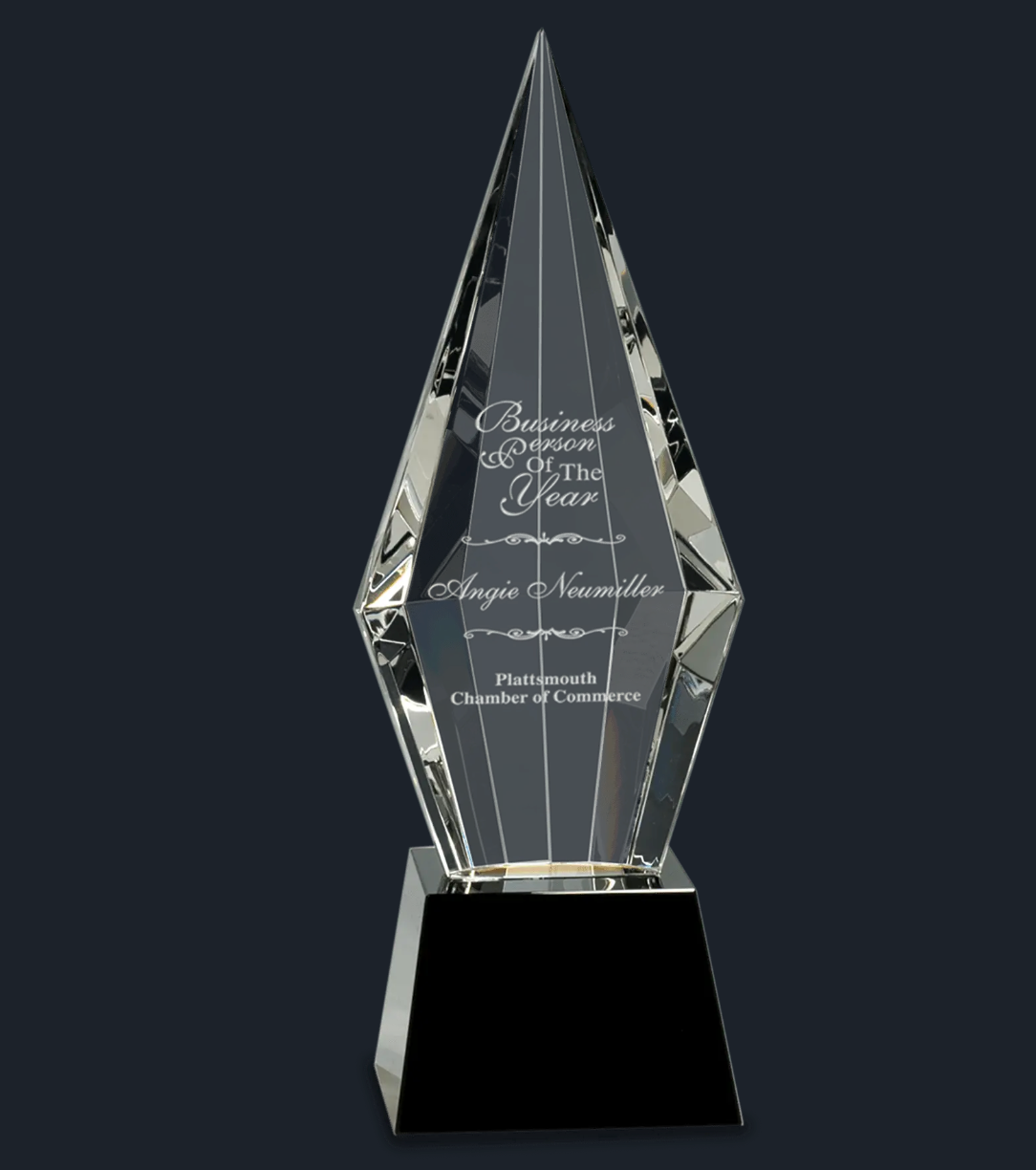 Obelisk Facet Crystal on Black Pedestal Base