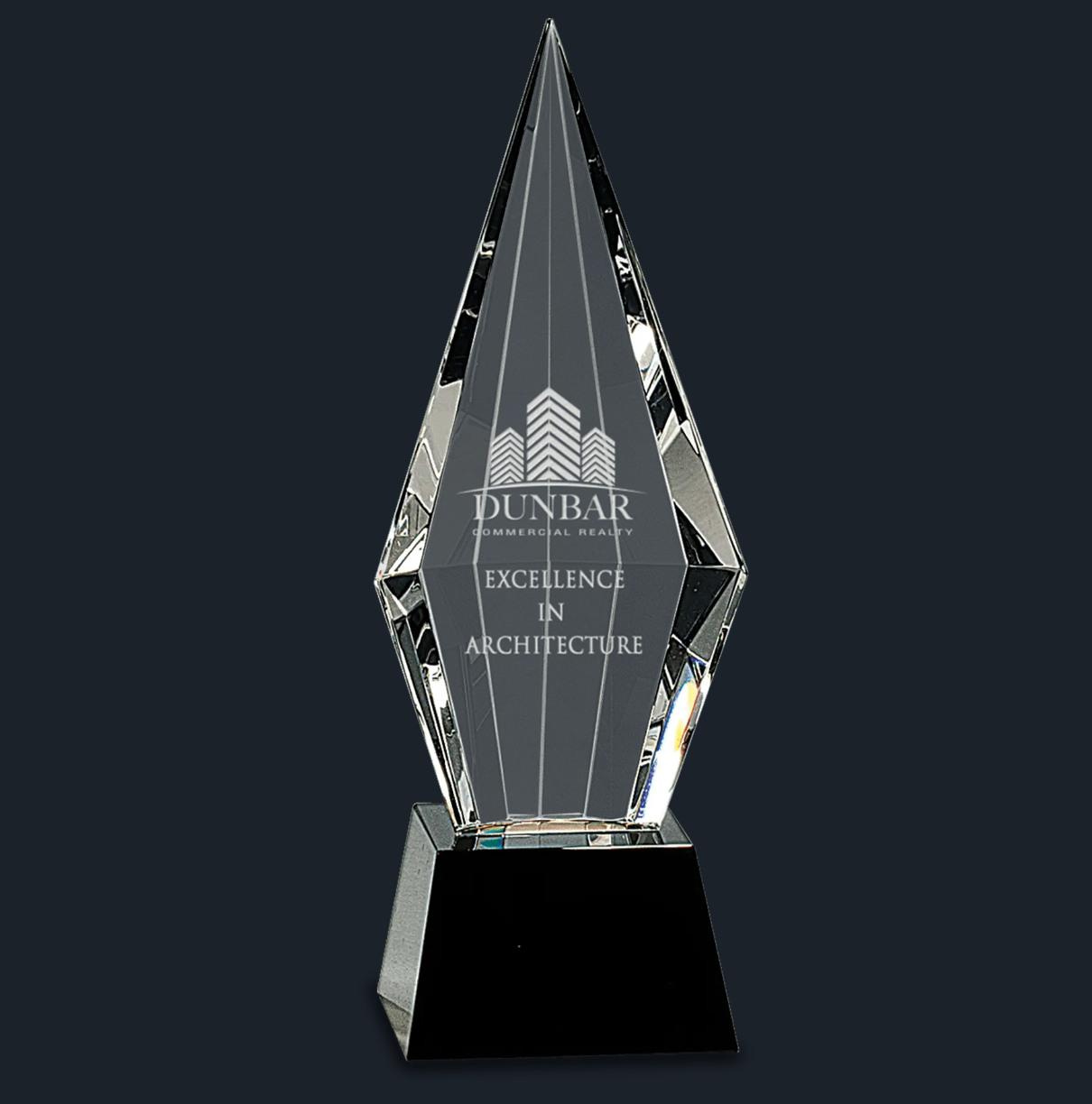 Obelisk Facet Crystal on Black Pedestal Base
